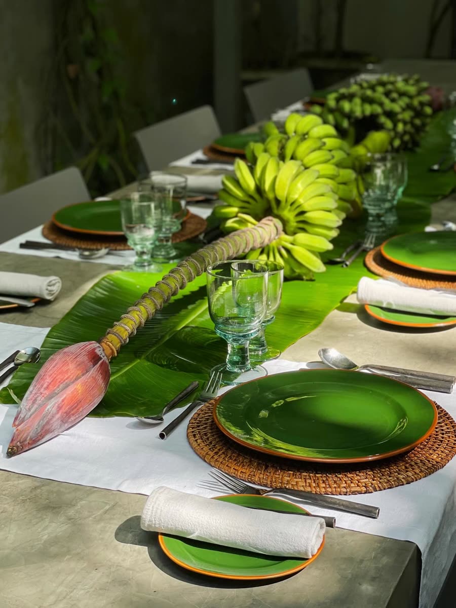 Banana-leaf place settings laid for a South Indian luncheon